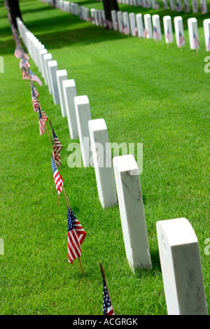 Decorated tombstones at Fort Sam Houston National Cemetary San Antonio Texas USA Stock Photo