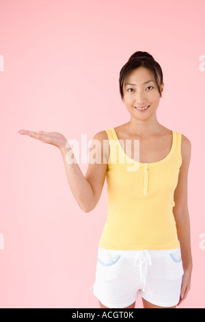 Woman standing looking at camera Stock Photo