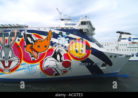 Olbia Sardina port Moby Lines Aki ferry with artwork depicting cartoon characters Italy Stock Photo