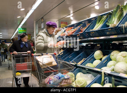 Shoppers at the fresh produce section of Tesco Bratislava Stock Photo