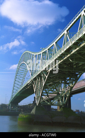 Runcorn-Widnes Road Bridge (The Silver Jubilee Bridge) from  Widnes West bank, England Feb 2006 Stock Photo