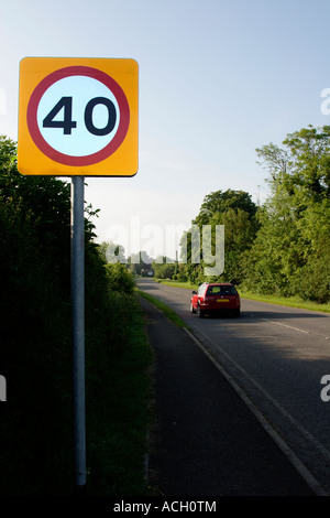 40 mph speed sign along road entering Stoke Goldington, Buckinghamshire, England, UK Stock Photo