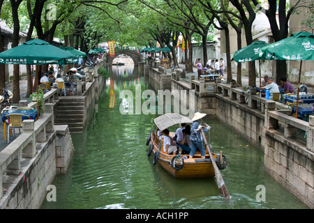 Restaurants Line Canal Woman Rowing Wooden Boat Tongli Water Town China Stock Photo