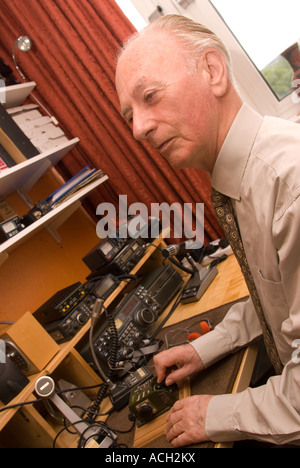 Blind man indulging his hobby for amateur radio, London, UK. Stock Photo