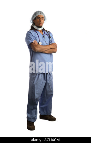 Full length portrait of young doctor in scrubs cut out on white background Stock Photo