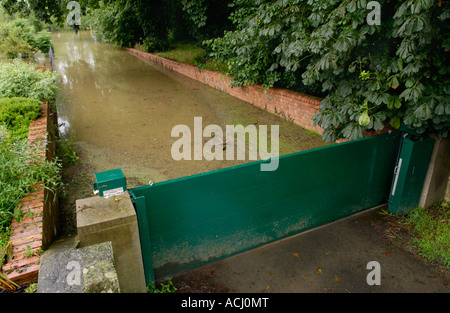 Flood gate at Deerhurst Gloucestershire England UK holding back the rising waters of the River Severn after prolonged rainfall Stock Photo