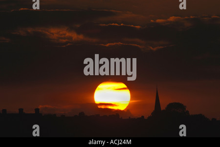 The Sun Setting Behind A Staffordshire Landscape In England. Stock Photo