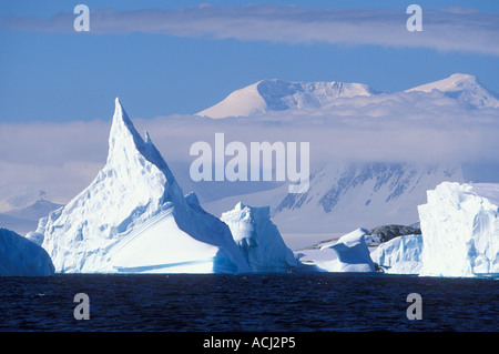 Antarctica Boothe Island Afternoon sun lights icebergs grounded near Port Charcot southwest of Lemaire Channel Stock Photo