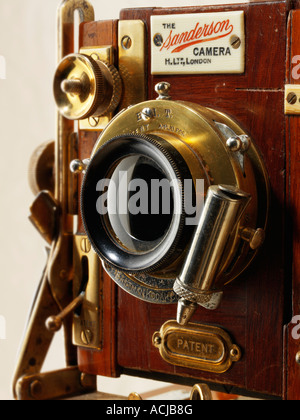 Close of lens mount on a wooden  Sanderson Tropical view plate camera Stock Photo