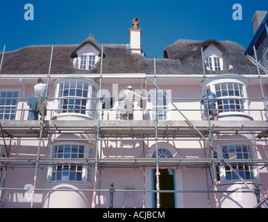 Sea front thatched house being renovated, Lyme Regis, Dorset, England, UK. Stock Photo