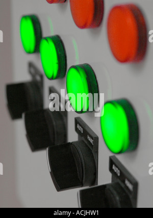 Computer room switch gear - electrical control panel with Red and Yellow lights and black switches Stock Photo