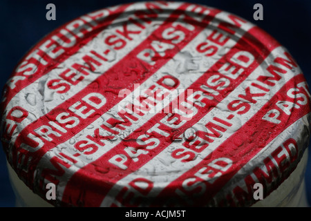 A close up view of a chilled semi-skimmed pasteurised milk bottle Stock Photo