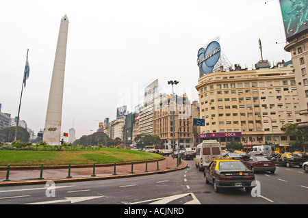 The obelisk, obelisco, on the Plaza de la Republica Square on the Avenida 9 Julio Avenue of ninth of July, taxis and cars in the foreground. Traffic. Modern office buildings. Buenos Aires Argentina, South America Stock Photo