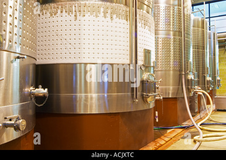 The gigantic vat hall with stainless steel fermentation tanks. a tank with a temperature control shielding cooled with sub zero Stock Photo