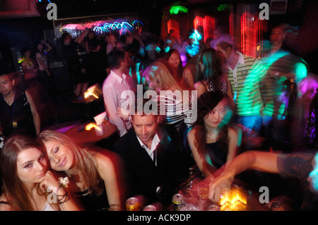 People of different nationalities at a nightclub (The World of Suzie Wong Club) in Beijing, China.  28 Jul 2007 Stock Photo