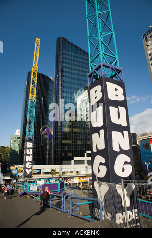 Catapult Reverse Bungy or Bungee rocket seat in city centre with modern skyscraper buildings Auckland city Stock Photo
