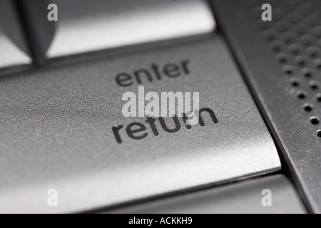Enter button on laptop computer Stock Photo