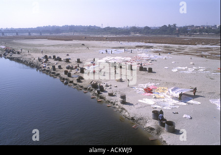 Laundry spread out to dry on the sandy banks of the Yamuna River Agra Uttar Pradesh India Stock Photo