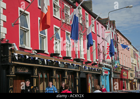 coloured shopfronts in Main Street Carrickmacross County Monaghan Ireland Stock Photo