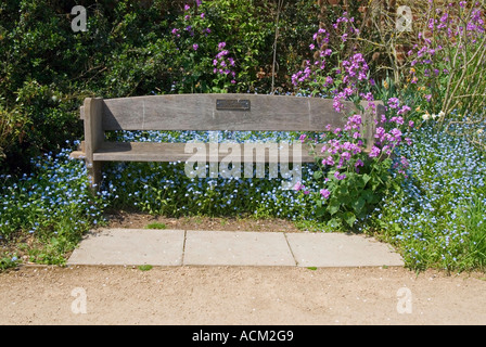 A bench in the enclosed gardens of Forty Hall in Enfield North London Stock Photo