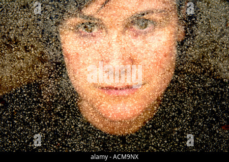 woman female colour color double exposure composite stone beautiful head face portrait special effect spooky scary eery attract Stock Photo
