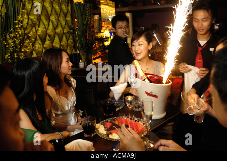 People at a nightclub (The World of Suzie Wong Club) in Beijing, China.  28 Jul 2007 Stock Photo