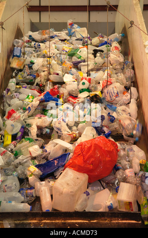 Plastic items collected and being baled by Wastesavers community recycling group from households in Newport South Wales Gwent UK Stock Photo