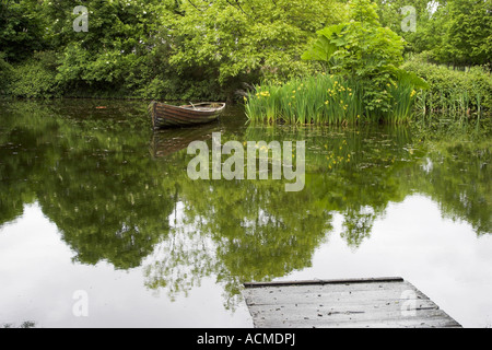 Rowing boat in a pond at Bunratty Folk Park Co Clare Ireland Stock Photo