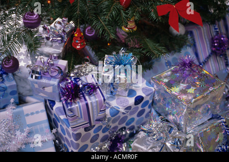 Presents under tree Christmas morning Stock Photo