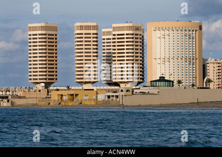 Tripoli, Libya. Dhat al Imad Office Complex and Corinthia Bab Hotel, Mediterranean Sea in foreground Stock Photo