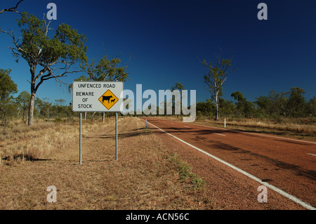 Warning on deserted road far north west Queensland Australia dsc 0023 Stock Photo