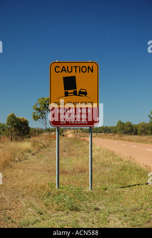 Warning on deserted road far north west Queensland Australia dsc 0033 Stock Photo