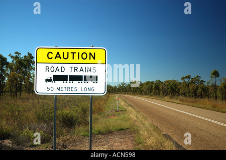 Warning on deserted road far north west Queensland Australia dsc 0039 Stock Photo