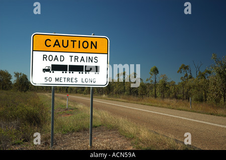 Warning on deserted road far north west Queensland Australia dsc 0040 Stock Photo