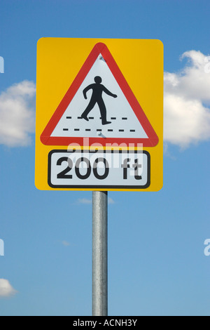Pedestrian crossing ahead 200 ft road sign Stock Photo - Alamy
