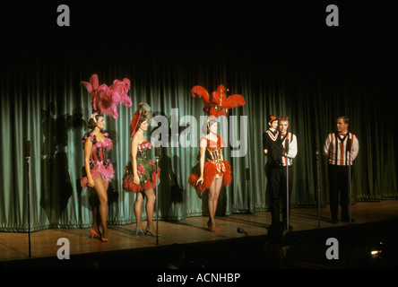 Six Flags over Texas stage show performers showgirl ventriloquist feathered costumes Six Flags over Texas USA America South Stock Photo