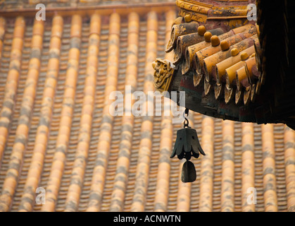 Bell and roof detail at Lama Temple Yonghegong in Beijing 2007 Stock Photo