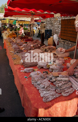 Various saucisson dry sausage for sale on a typical French market in The South of France. Stock Photo