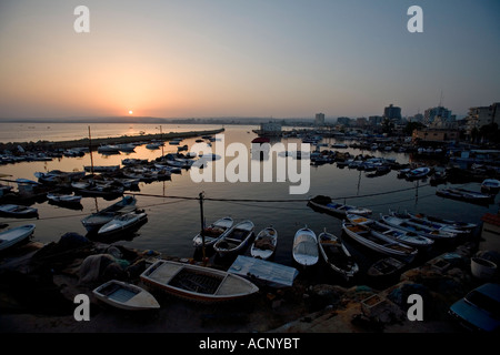 Sunrise over Tyre Harbour, Tyre, Lebanon Stock Photo