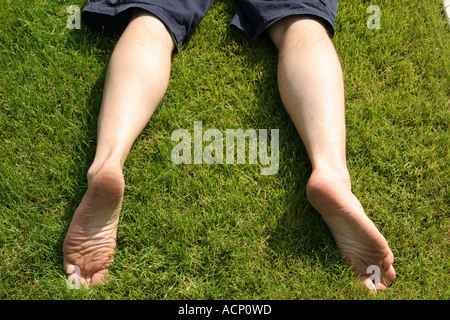 Legs on the grass - Beine auf dem Rasen Stock Photo