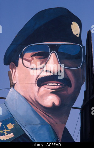 Saddam Hussein poster portrait, Liberty Square wearing military uniform Sadr City, Saddam City, Al Thawra district Baghdad Iraq 1980s 1984 HOMER SYKES Stock Photo