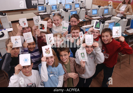 School children students with holiday cards they made in computer class Connecticut USA Stock Photo