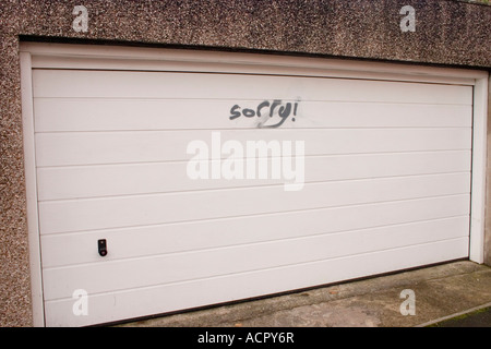 Sarcastic garage door graffiti Roath Cardiff UK Stock Photo
