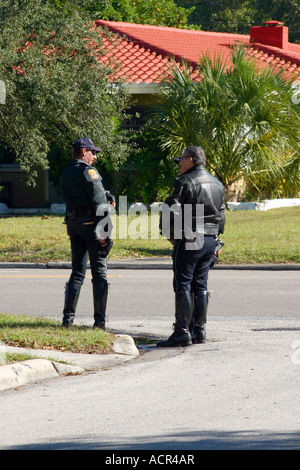 Police Officer Rear Rear view of two male police officers in uniform at public event Stock ...