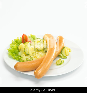 Wiener with potato salad, close-up, elevated view Stock Photo