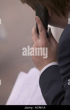 Businessman using mobile phone Stock Photo