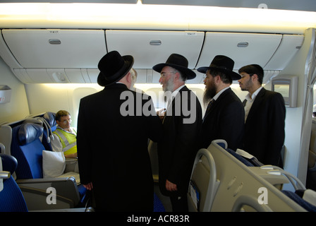 Ultra orthodox Jews Passengers inside El Al airplane Stock Photo