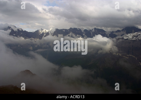 Snow capped mountains seen from Schilthorn Jungfrau region Bernese Oberland Swiss Alps Switzerland Europe Stock Photo