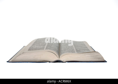 An open dictionary on a white surface - An open book Stock Photo