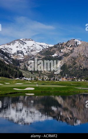 Sierra Nevada peaks Olympic Village and golf course at Resort at Squaw Creek Olympic Valley Lake Tahoe California Stock Photo